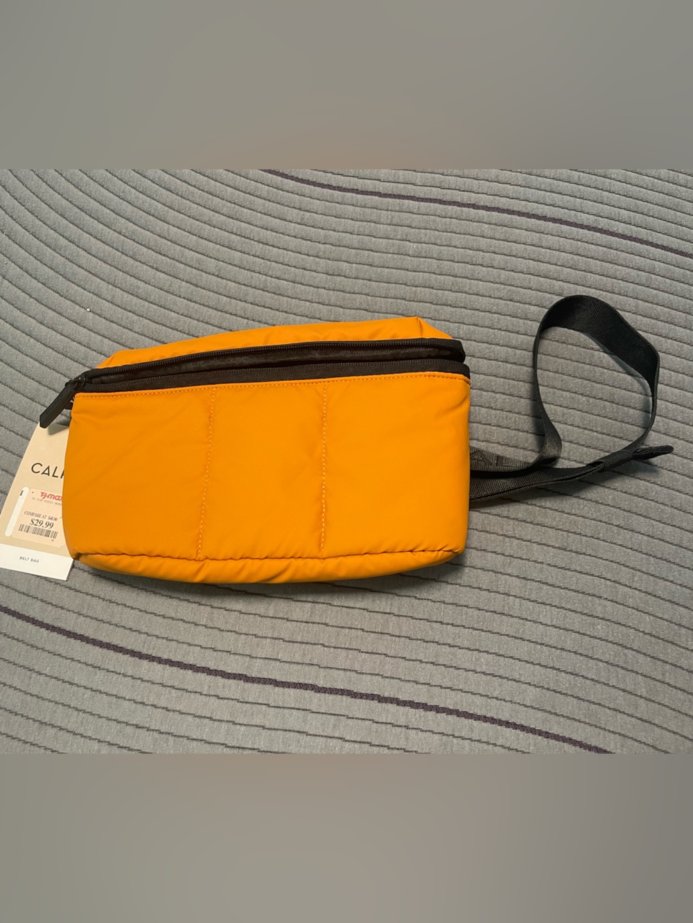 Calpak Bright Orange Quilted Belt Bag with Black Accents